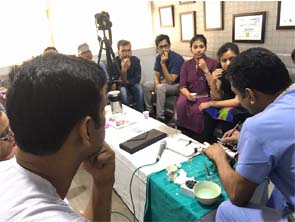 doctor demonstrating medical instrument